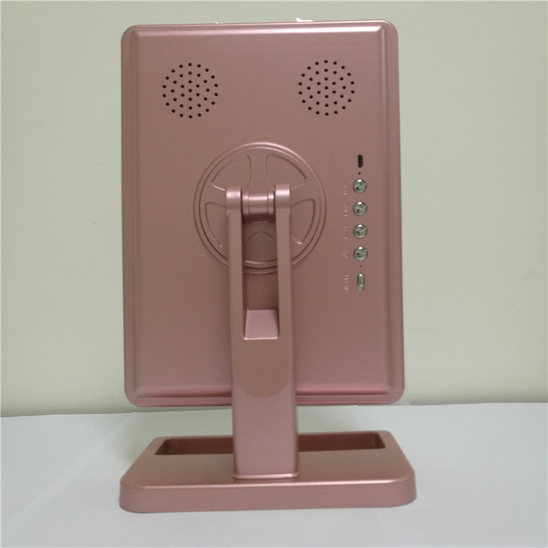 Back view of 10X magnifying Touch Screen Makeup Mirror With LED Light showcasing Bluetooth speakers and controls.