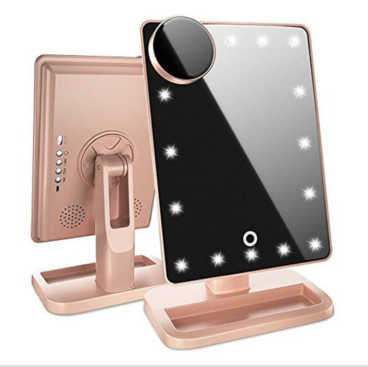 10X magnifying Touch Screen Makeup Mirror With LED Light featuring Bluetooth speaker and adjustable stand.